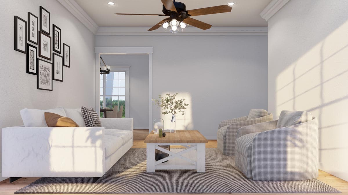 Rendering of a living room with white sofa, armchair seating, wood coffee table, and gallery wall.