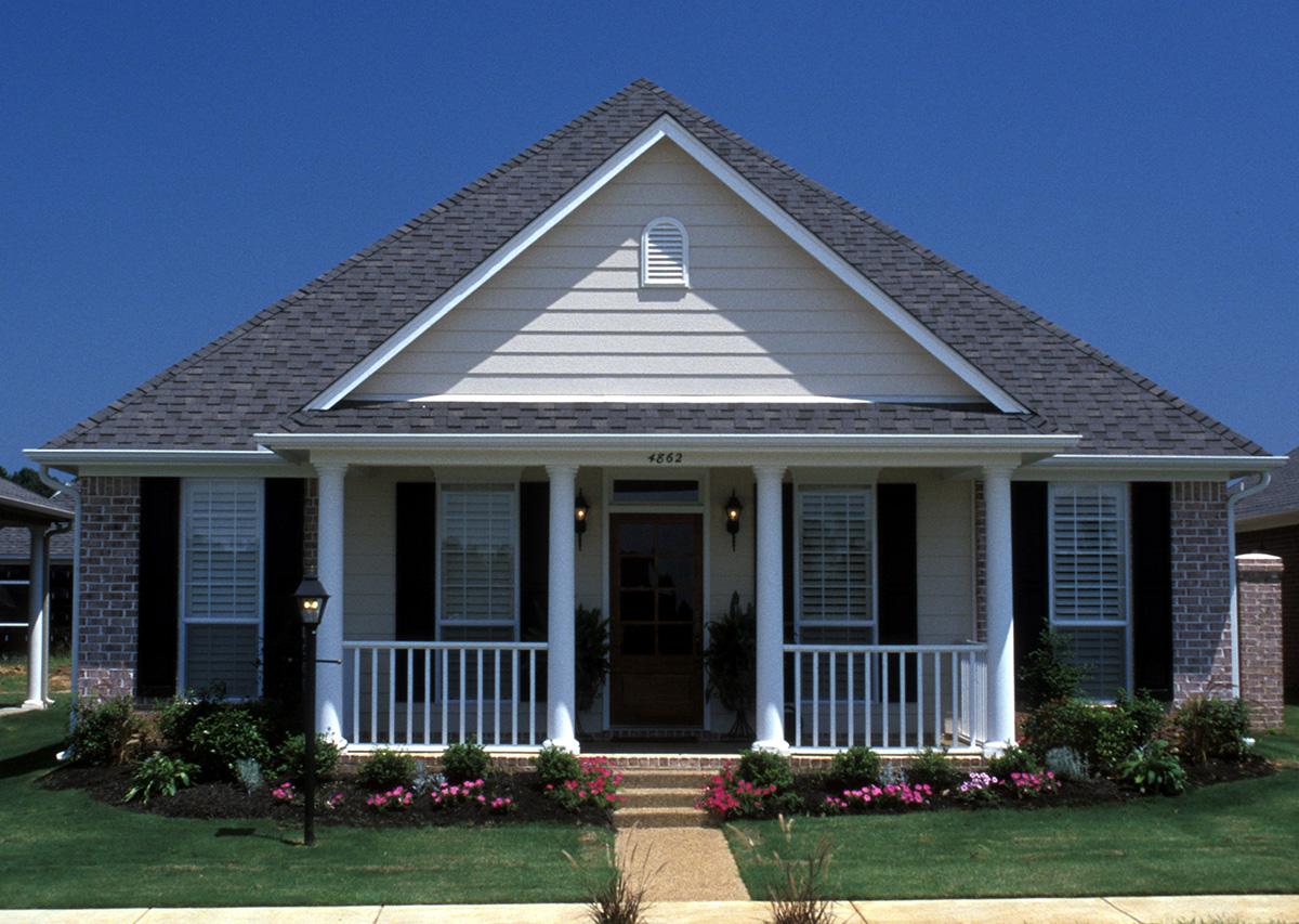 House plan exterior: One-story, gabled roof, covered front porch with columns, brick and siding.