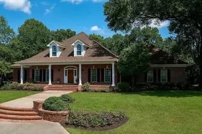 Spacious Ranch House Plan with Bonus Room and Expansive Outdoor Terrace