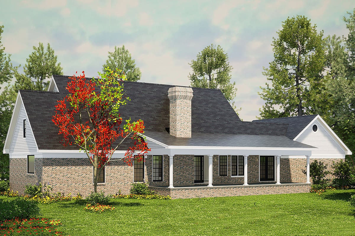 House plan exterior: Ranch style, brick base, white siding gables, prominent chimney, and full-width covered porch.