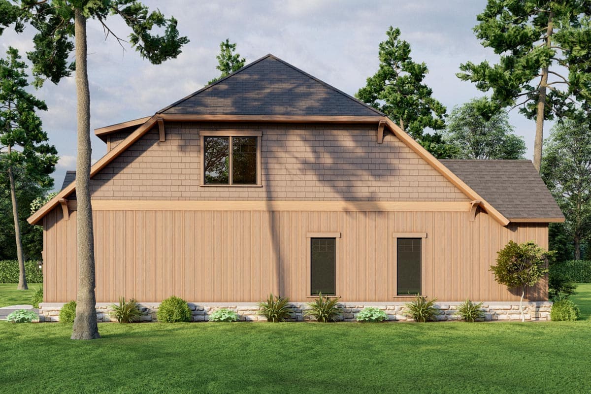 House plan exterior: Tall gable roof with shake siding above wood siding and stone foundation. One upper window, three lower windows.