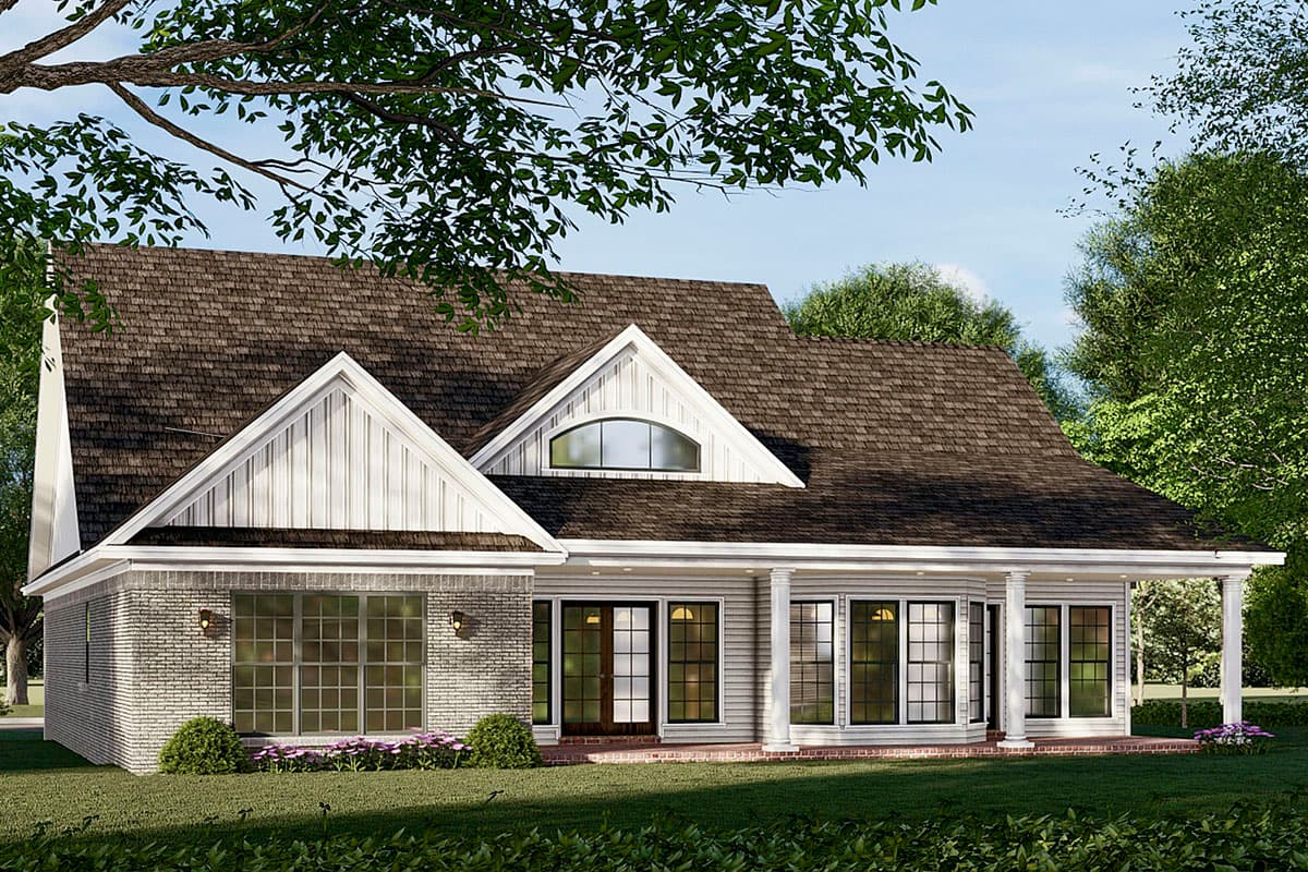 House plan exterior: Traditional style, two stories, gabled dormers, brick and siding facade, covered porch with columns.
