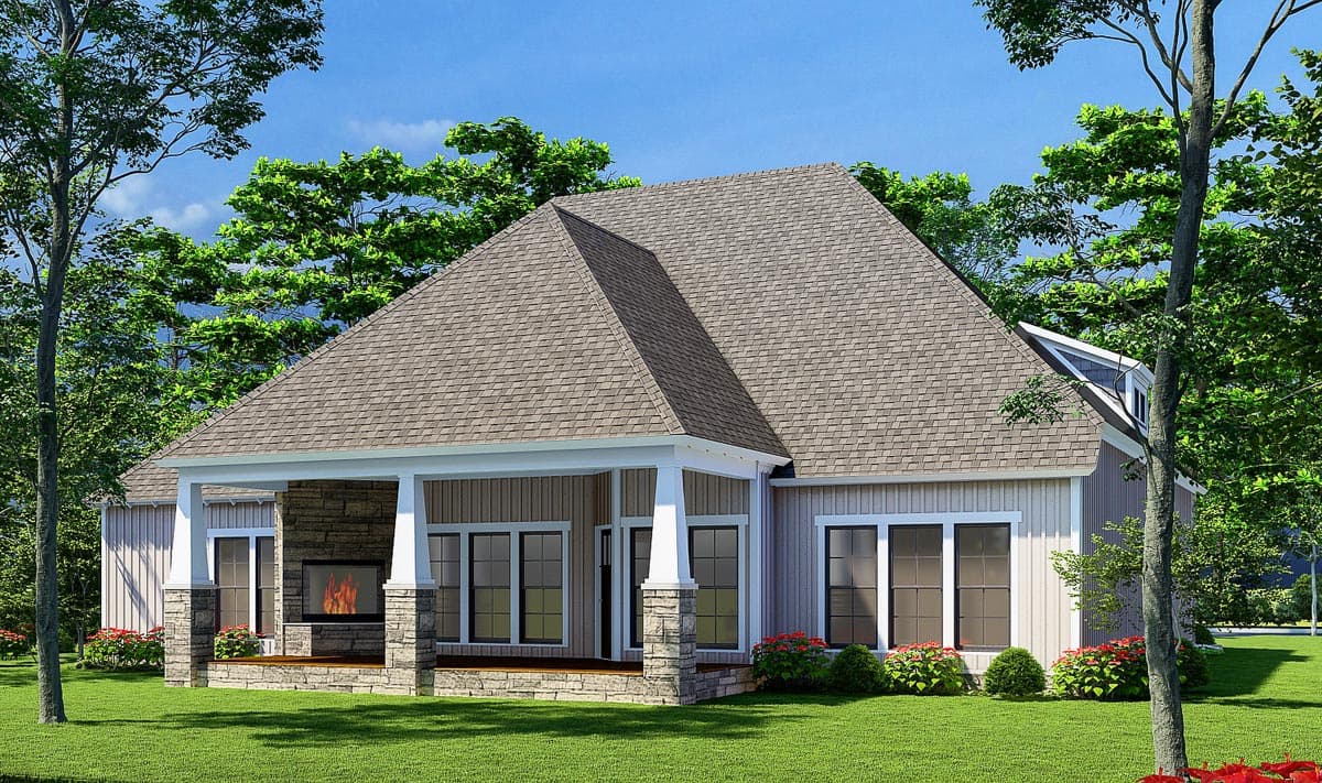 House plan exterior: One-story home with covered porch, stone fireplace, gable dormer, and large windows.