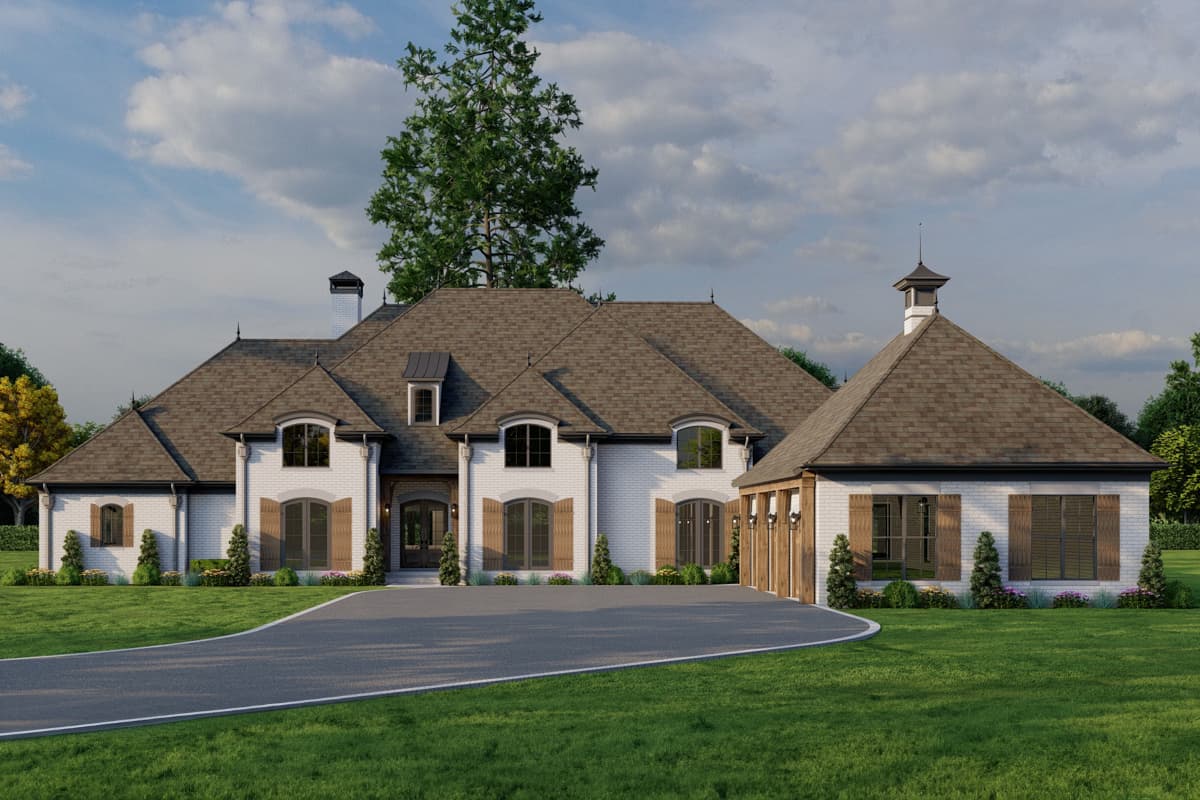 House plan exterior: Two-story white brick home with steep gabled roof, dormers, arched windows, and attached garage with cupola.