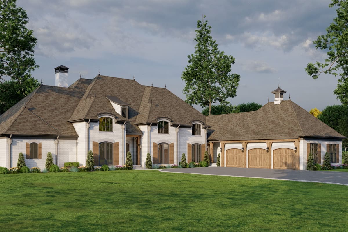 House plan exterior with white brick facade, multiple gables, arched windows, and a three-car garage with carriage doors.
