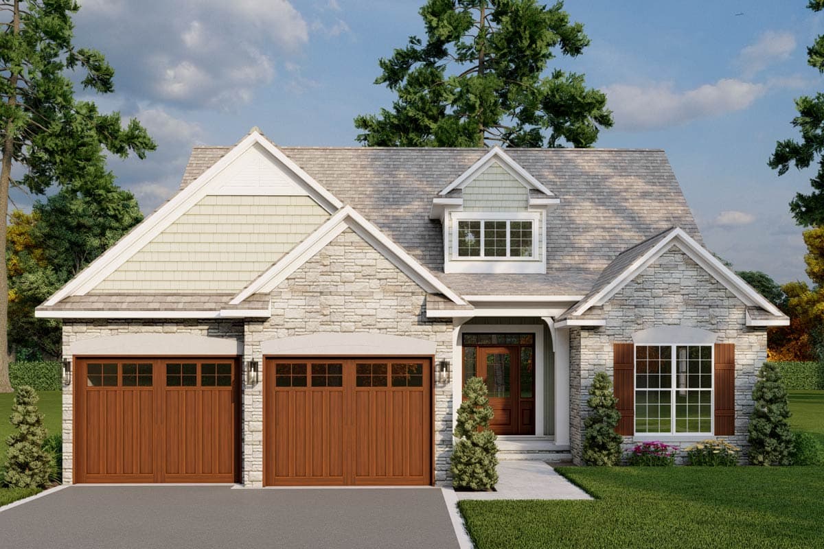 House plan exterior. Two-story home with stone facade, two-car garage, multiple gables, and a dormer above the entry.