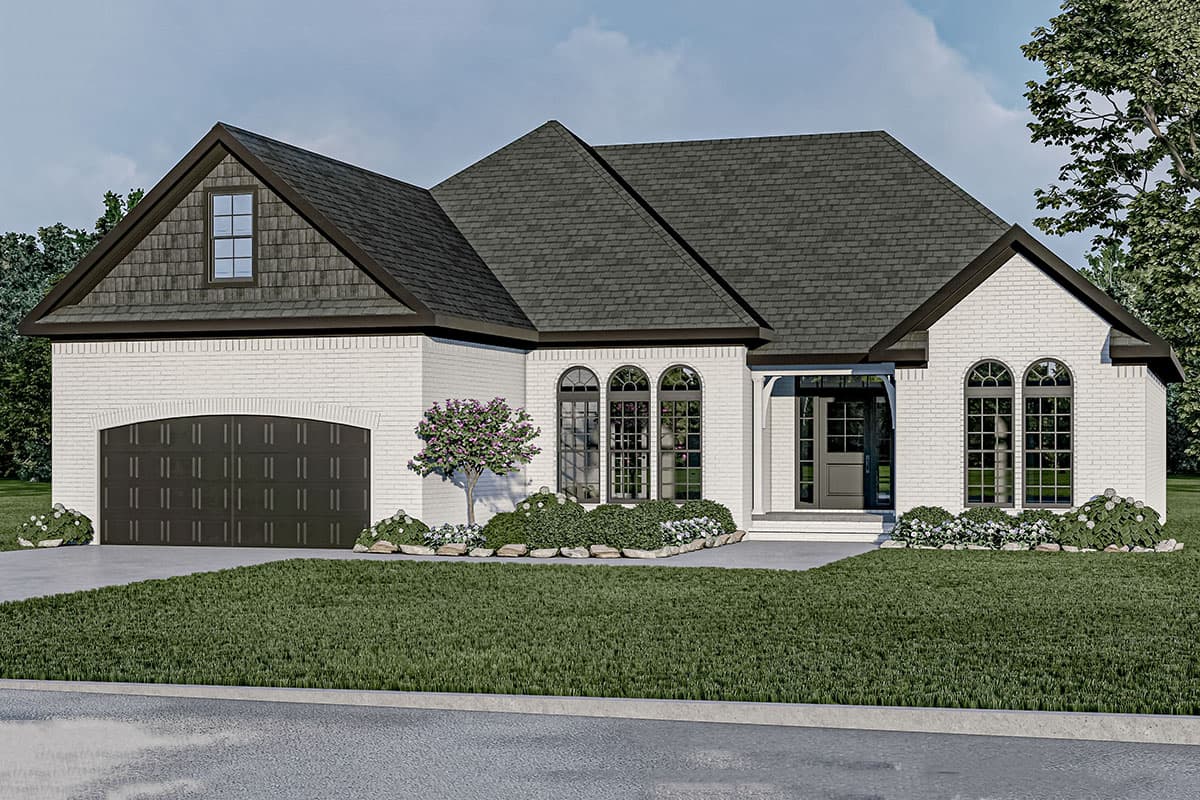 House plan exterior with brick facade, arched windows, and a multi-gabled roof. Features include a garage with arched door and a covered entryway.
