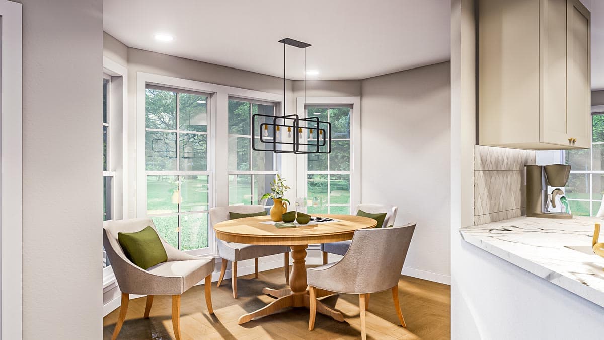 A modern dining room featuring a round wooden table, four upholstered chairs, and a unique geometric chandelier. Large windows offer a view.