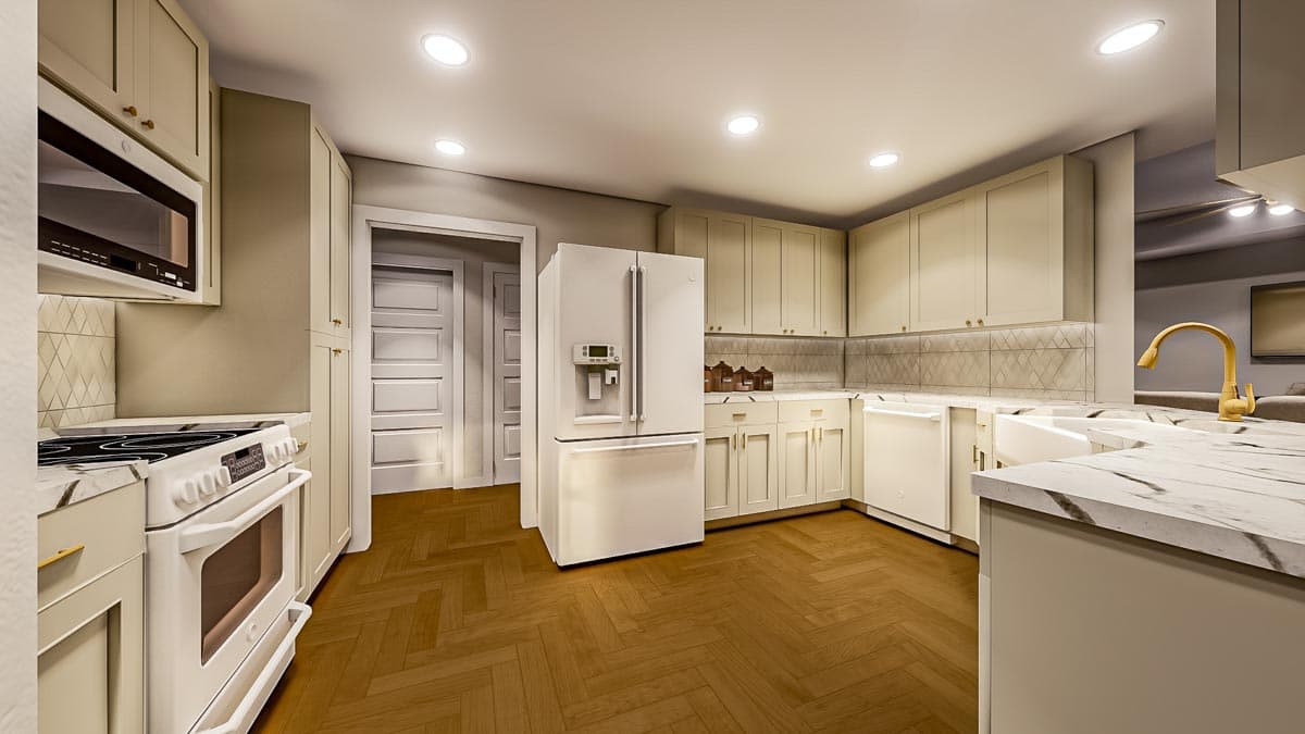 A newly renovated kitchen features cream-colored cabinets, white appliances, and a marble countertop. The hardwood floor adds warmth to the bright room.