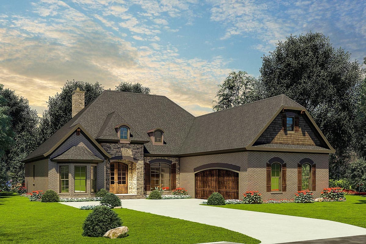 House plan exterior with stone and brick facade, multiple gables, arched garage door, and dormers. Two-story design with a slate roof.