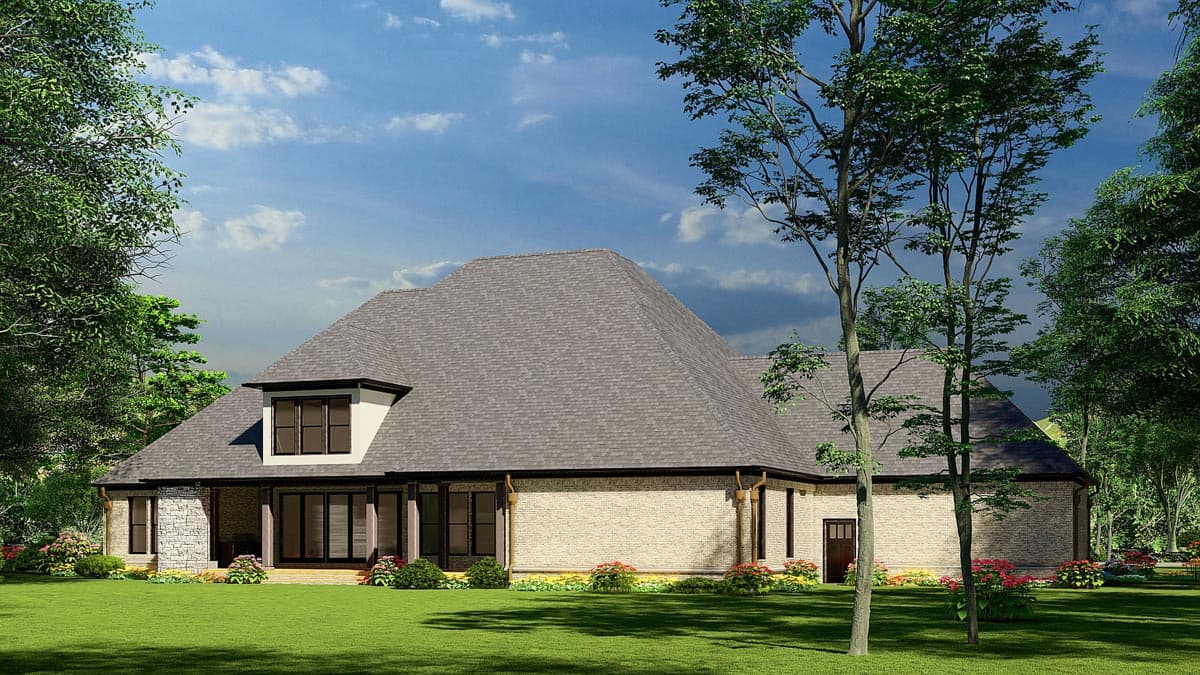 House plan exterior, single-story design with brick facade, pitched roof, dormer, covered porch with columns, and stone accents.