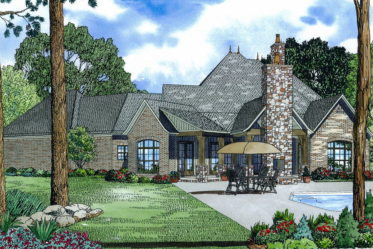 House plan exterior: Brick ranch with stone chimney, gabled dormers, arched windows, covered porch and pool.