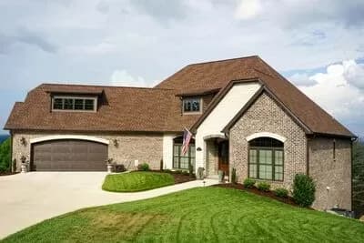 Split Bedroom Home Plan With Angled Garage and Safe Room - 2408 Sq Ft