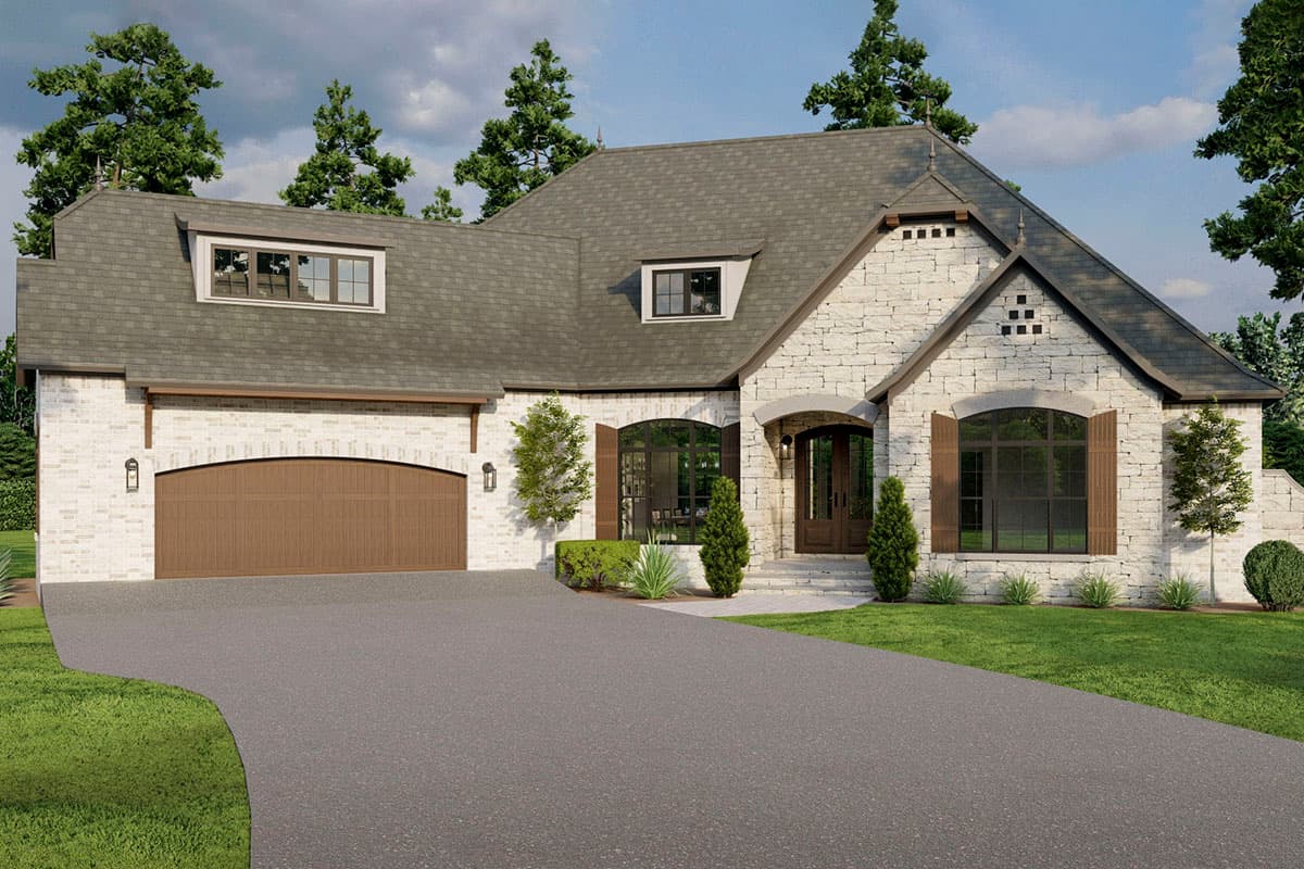 House plan exterior. Two-story, stone-and-brick facade with a gable roof, arched garage door, and dormers. The entrance has an arched entryway.