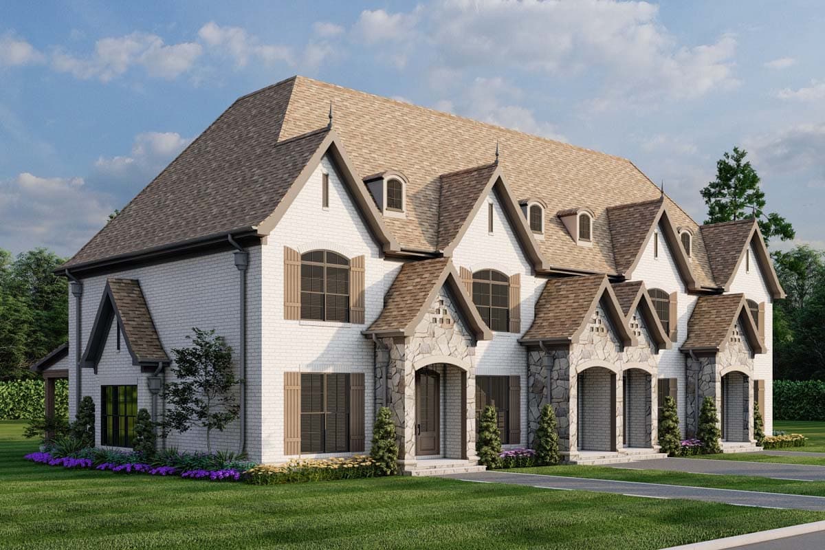 Two-story house plan exterior with white brick, stone accents, multiple gables, dormers, and arched windows.