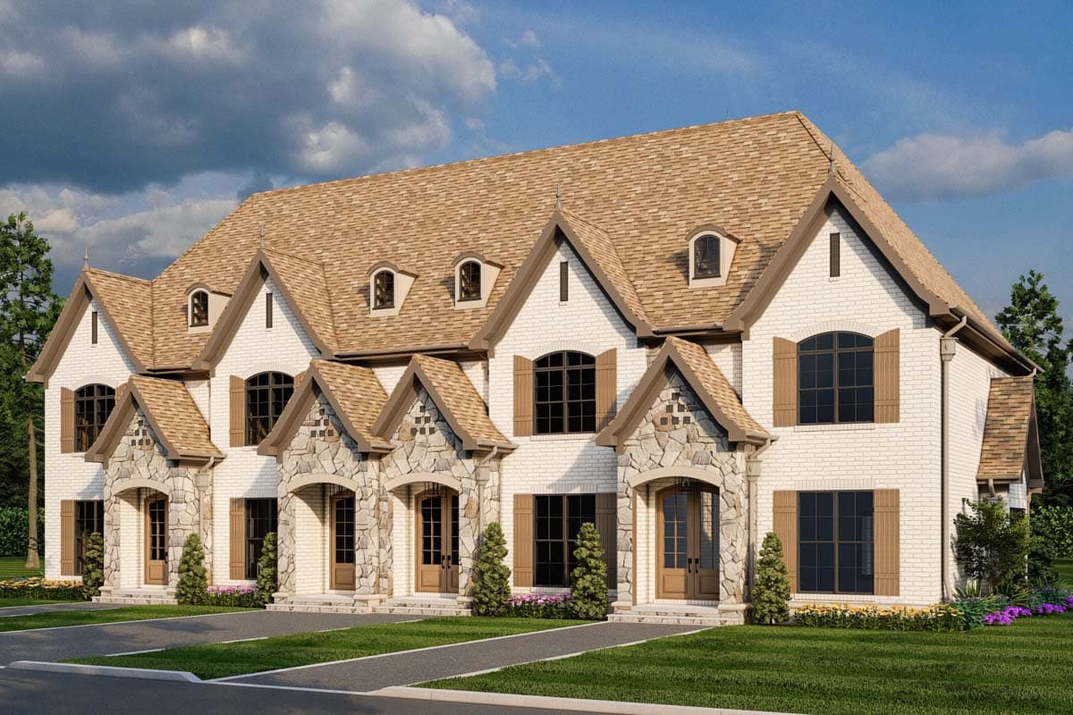 House plan exterior. Two-story with stone accents over entryways. Features include dormers, gabled rooflines, and arched windows with shutters.