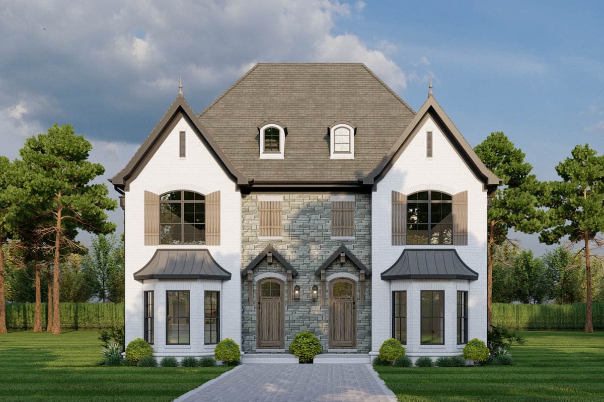 House plan exterior: Two-story home with Tudor-style gables, stone accents, dual dormers, and arched windows.