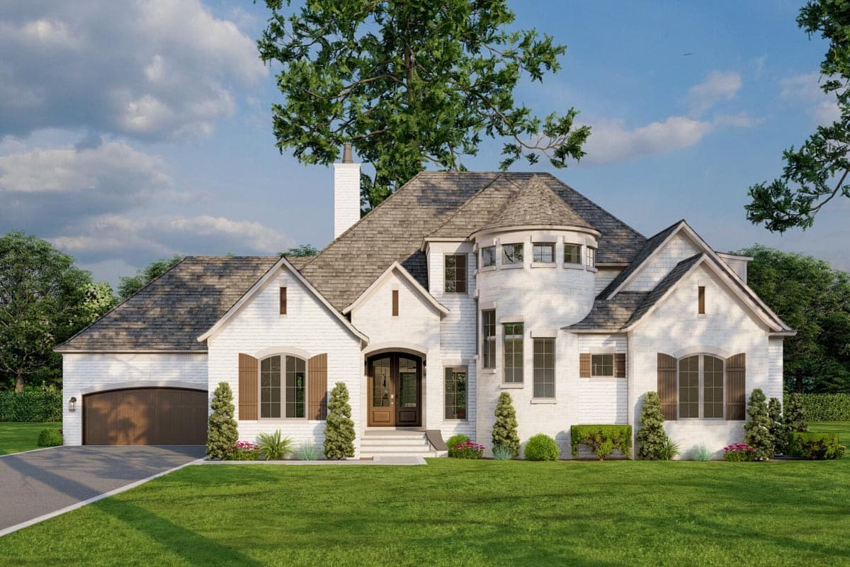 House plan exterior. Two-story home with a turret, gable roof, and a front-entry garage. Features include arched entry and shutters.