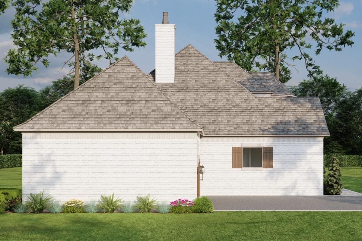House plan exterior view with white brick walls, multi-level gabled roof, and prominent chimney.