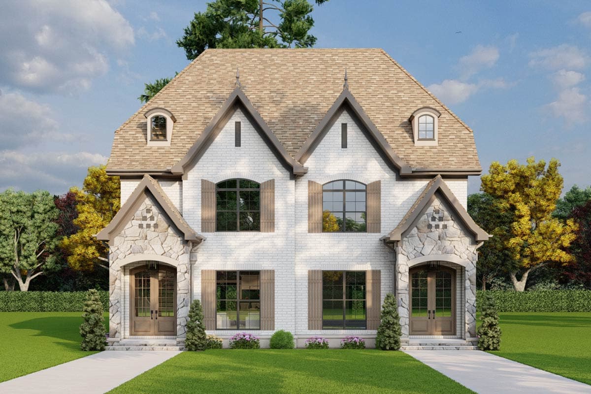 House plan exterior: Two-story brick home with stone accents, arched entryways, gable dormers, and multiple gables.