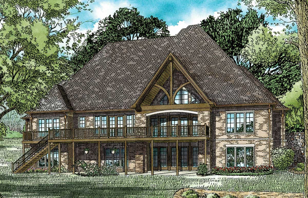 House plan exterior: Two-story brick home with a prominent gabled roof, arched window, and multiple balconies. Features a walk-out basement level.