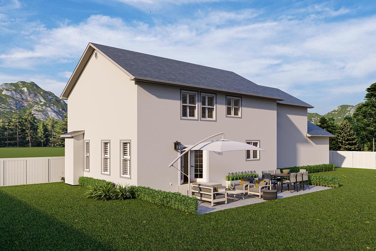 Two-story house plan exterior with multiple windows, a side entrance door, and a patio area with outdoor furniture.