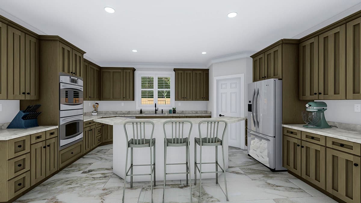 Kitchen with U-shaped counter, island with seating, stainless steel appliances including double oven and refrigerator, and extensive cabinetry.