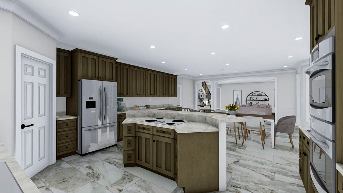 Kitchen interior with dark wood cabinetry, stainless steel refrigerator, island with stovetop, and marble flooring.
