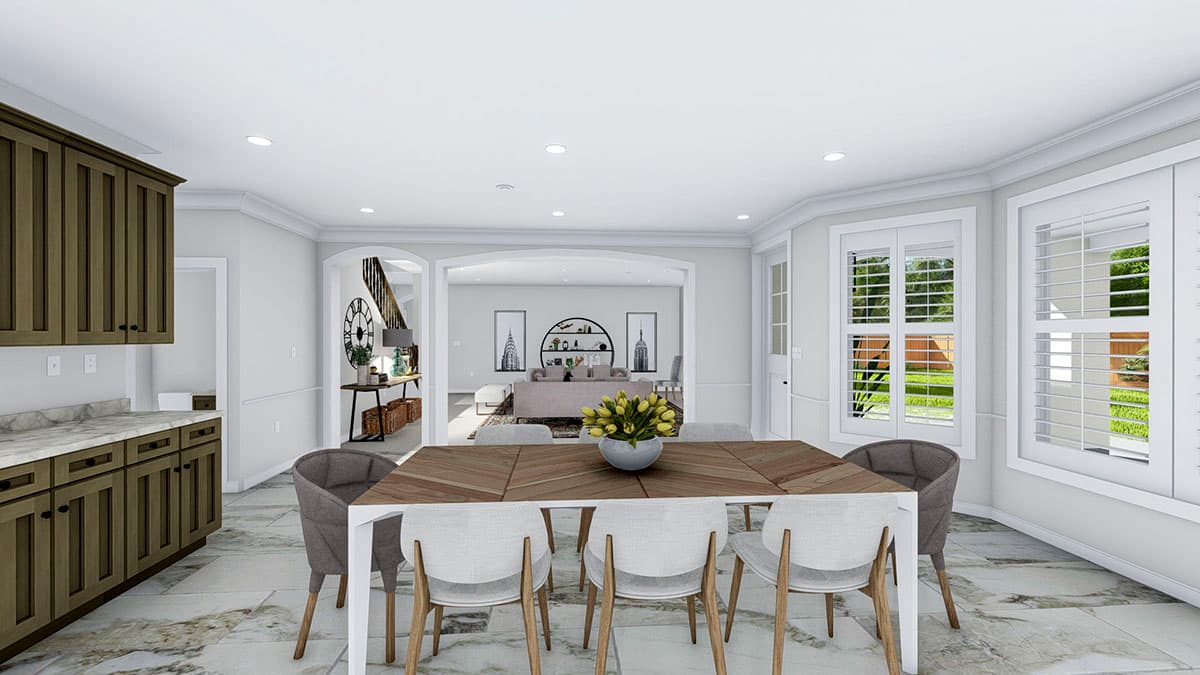 Interior rendering of a dining area with a table and chairs, opening to a living room with built-in shelving.