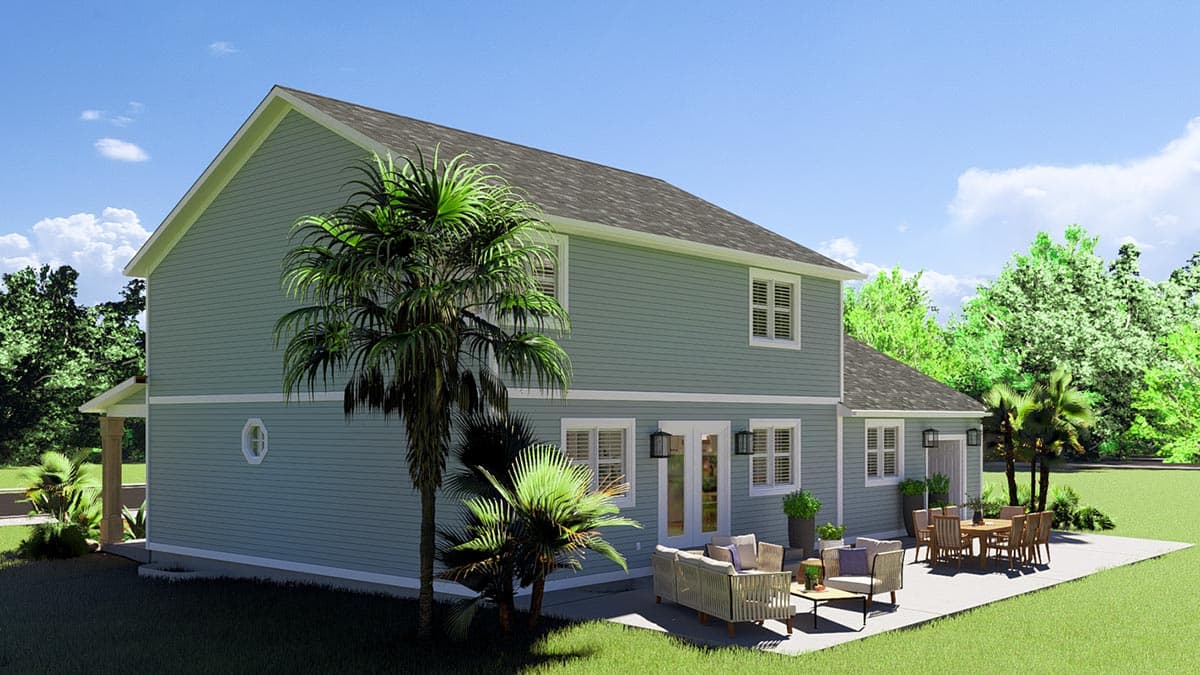 Two-story house plan exterior with double doors, multiple windows, and a covered porch. A patio with seating is visible.