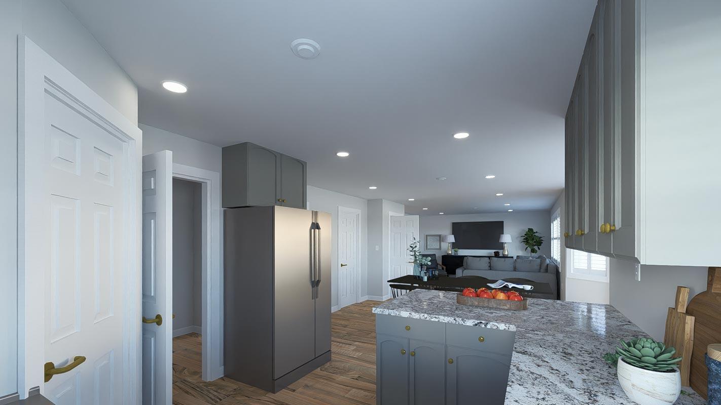 Interior rendering of a kitchen with a stainless steel refrigerator and gray cabinets, opening to a living area with sofa and television.