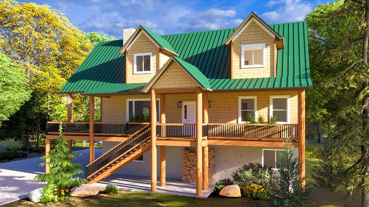 Log home exterior with green metal roof, large wraparound porch, and prominent gables. Two stories visible.