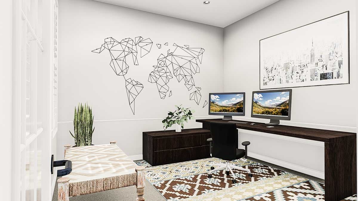 Home office with geometric world map decal, large desk with dual monitors, and patterned area rug.