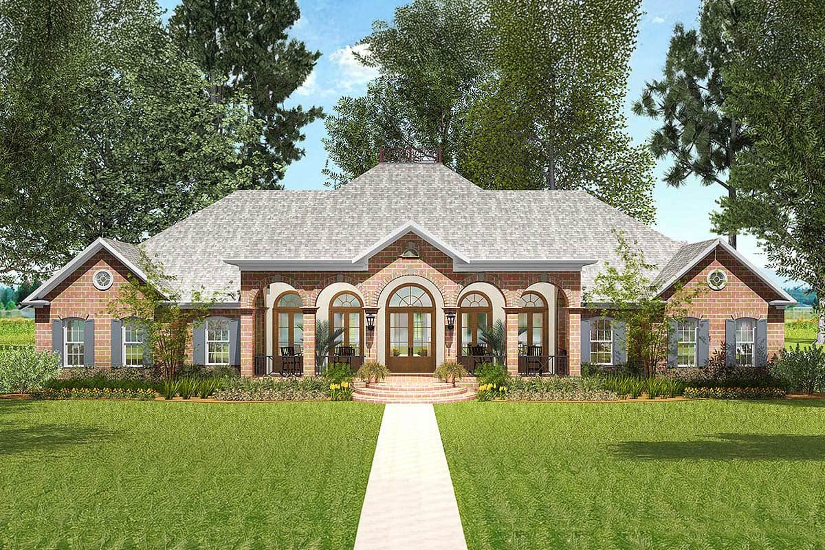 House plan exterior: One-story brick home with arched entryways, a central hipped roof, and gable dormers on side wings.