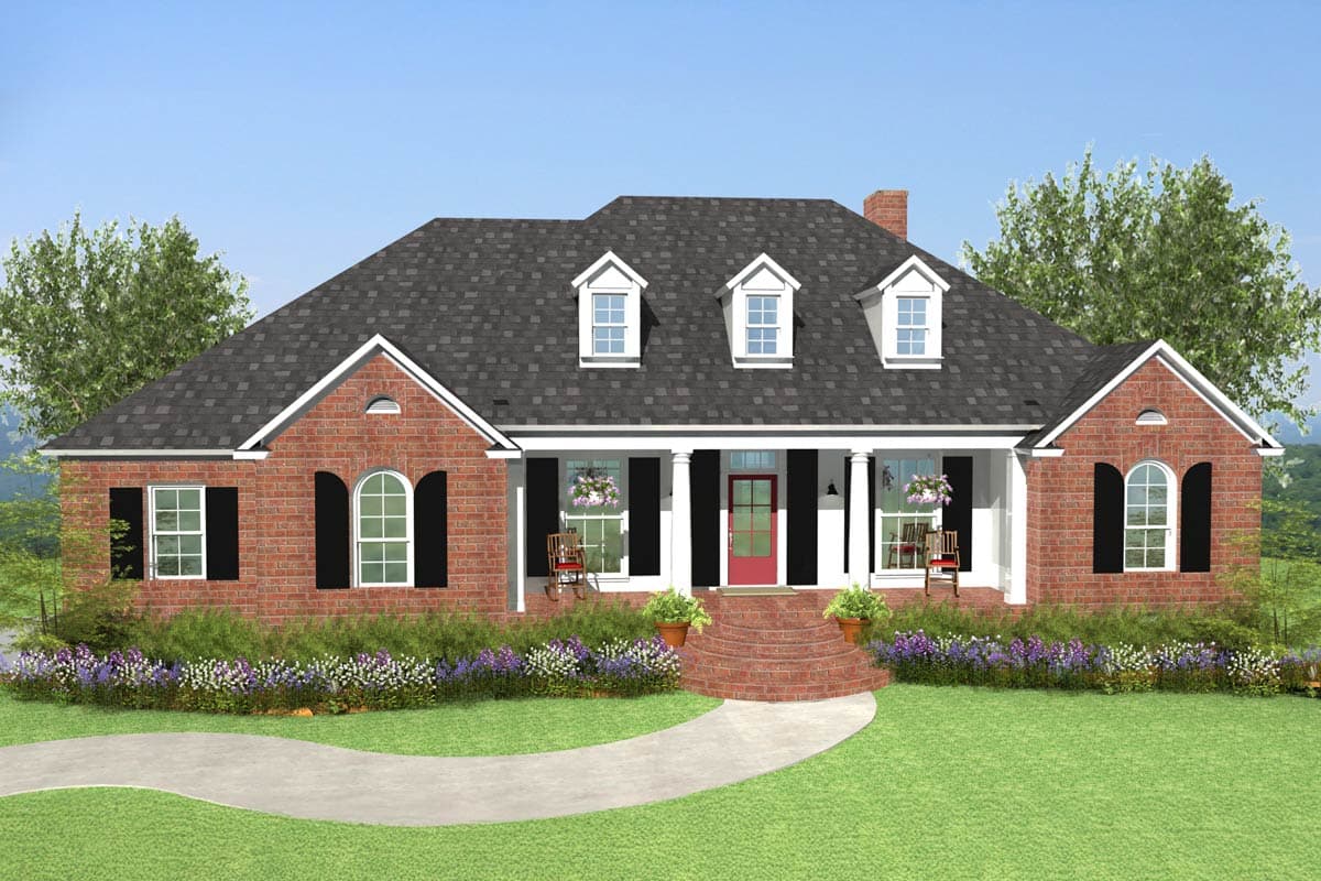 House plan exterior: brick, one-story, central porch with columns, dormers, and arched windows.
