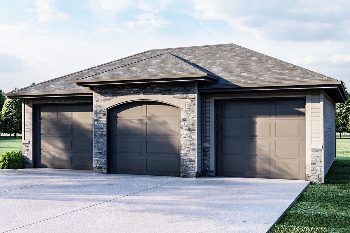 House plan exterior: Three-car garage with stone accents and arched central garage door.