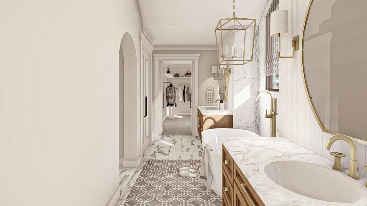 Rendering of a bathroom with a freestanding tub, double vanity, walk-in closet, and arched doorway.