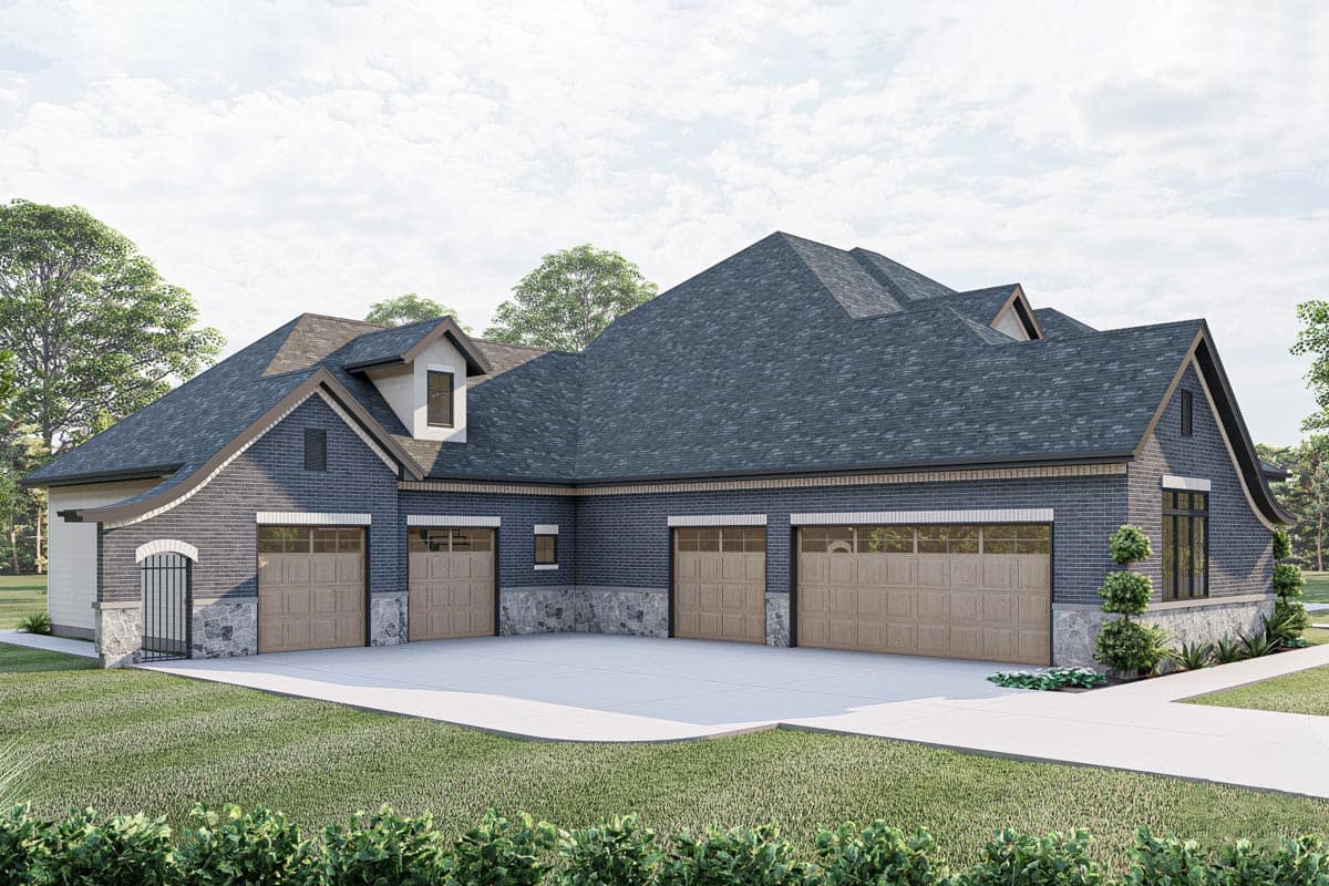 House plan exterior: Contemporary style with dark brick, stone accents, multiple gables, and a four-car garage.
