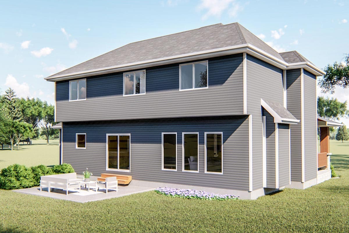 Two-story house plan exterior with gray siding, multiple windows, sliding glass doors, and a patio with outdoor furniture.