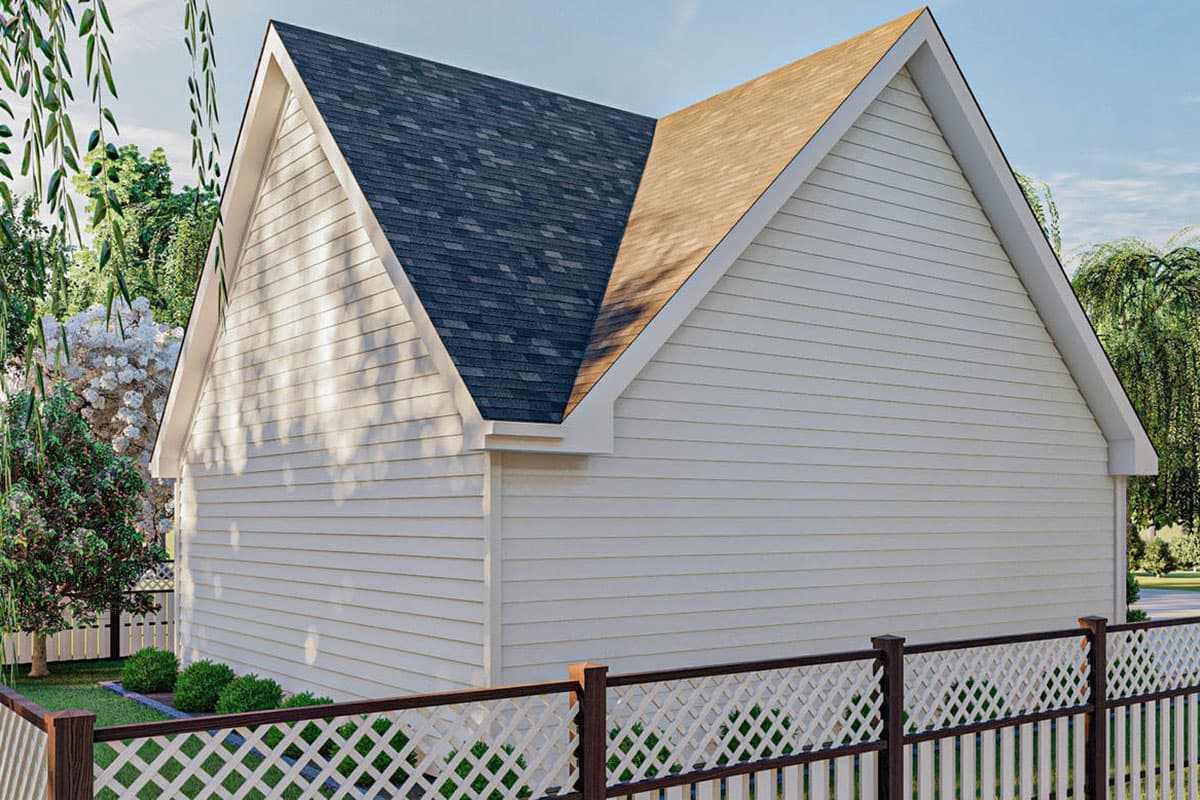 House plan exterior with vinyl siding, gable roof, and white lattice fence.
