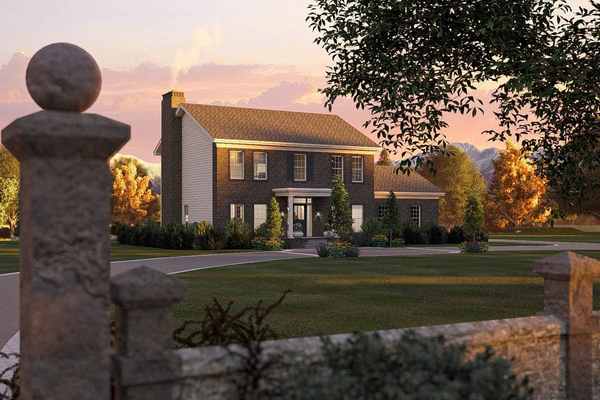 Two-story brick house plan exterior with a covered portico entrance, prominent chimney, and white siding on one side.