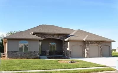 Traditional Home Plan with Large Garage