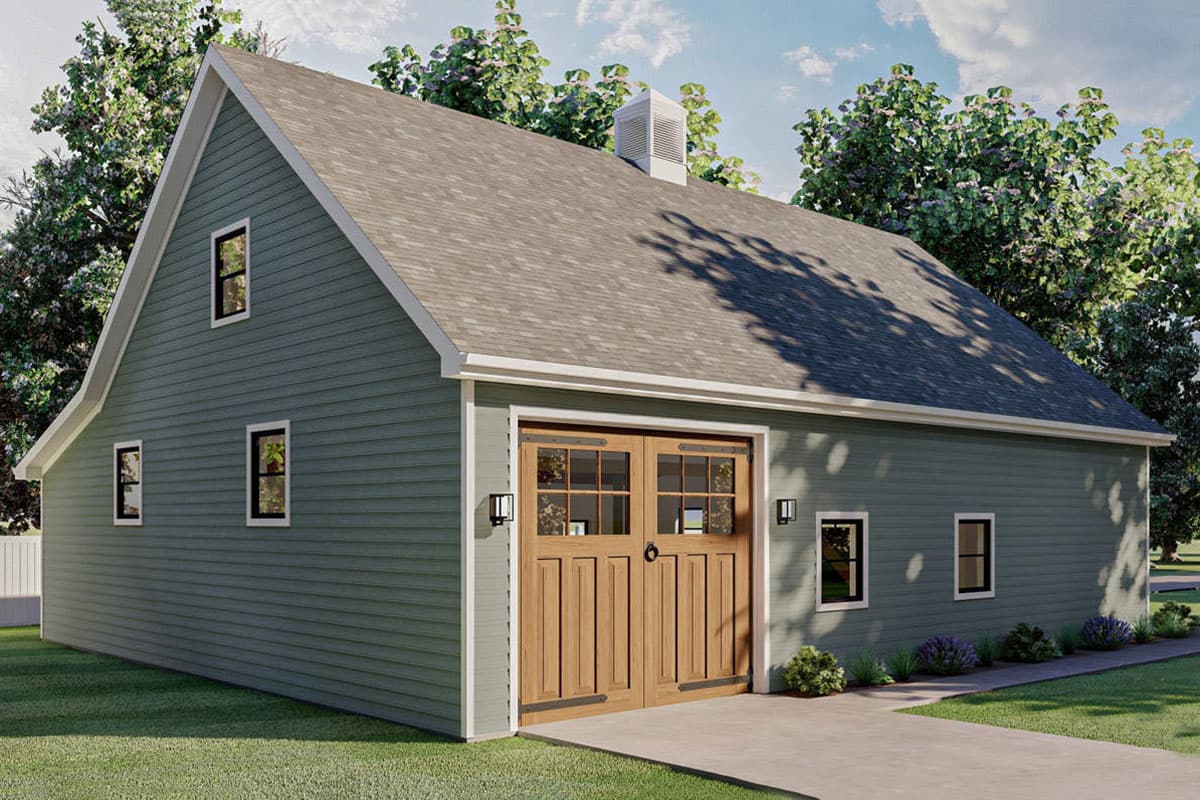 House plan exterior with gambrel roof, two-car garage doors, and multiple windows.