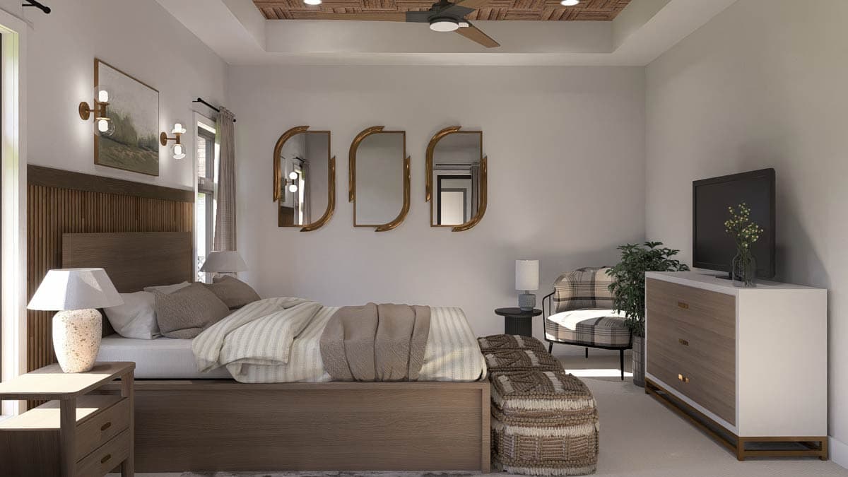 Bedroom interior with a bed, wood slatted headboard, tray ceiling with wood paneling, and decorative mirrors.