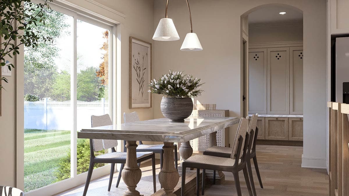 Interior rendering of a dining area with a marble-top table, pendant lights, and a large sliding glass door overlooking a backyard.