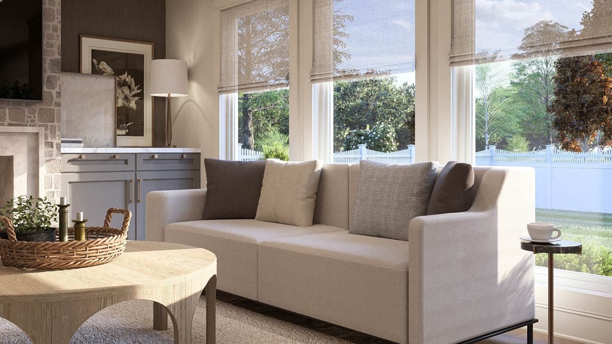 Living room interior rendering with neutral sofa, stone fireplace surround, built-in gray cabinets, and large windows overlooking a yard.