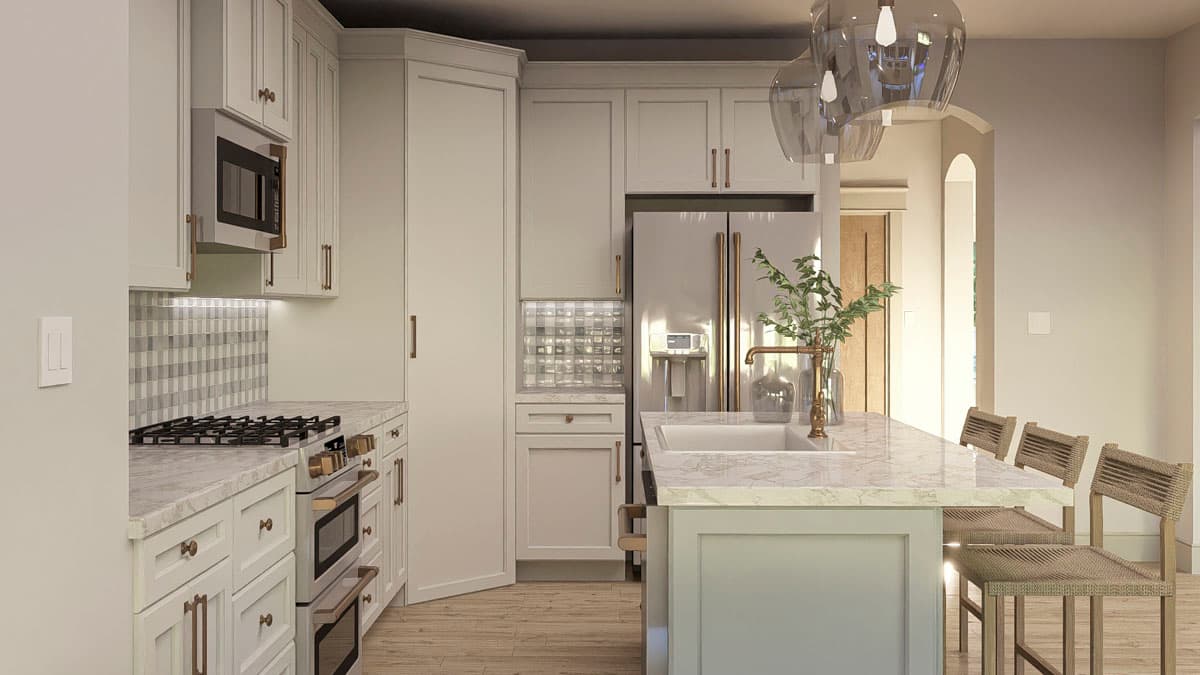 Kitchen with white cabinetry, marble countertops, stainless steel appliances, and a center island with bar seating.