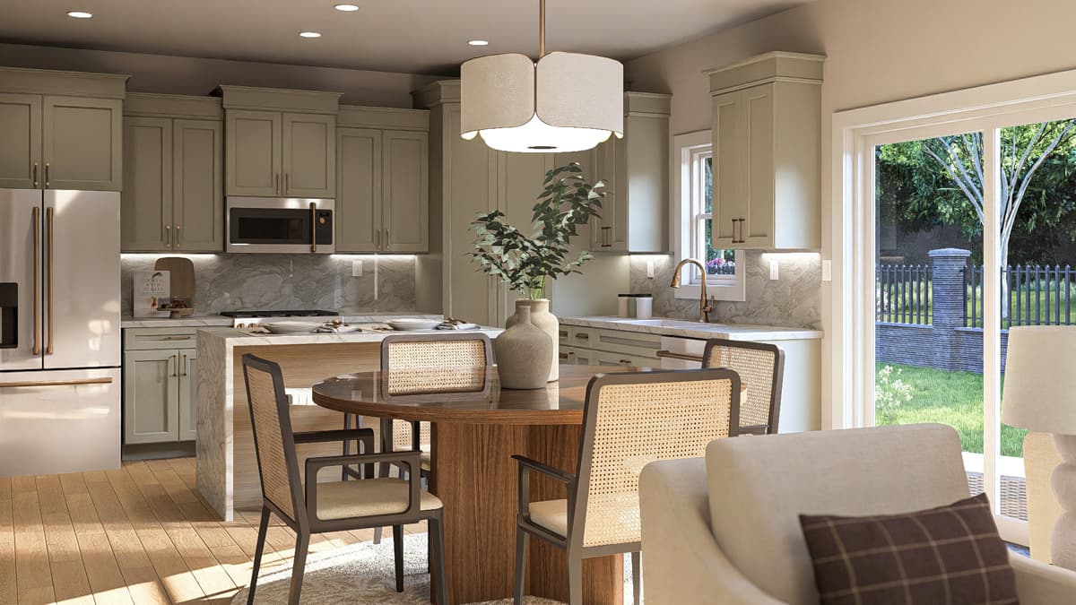Kitchen and dining area with island, cane-back chairs, pendant light, and large sliding glass door to yard.