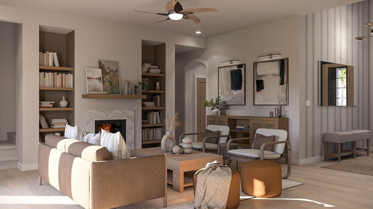Living room with fireplace, built-in bookshelves, two chairs, coffee table, and sofa.