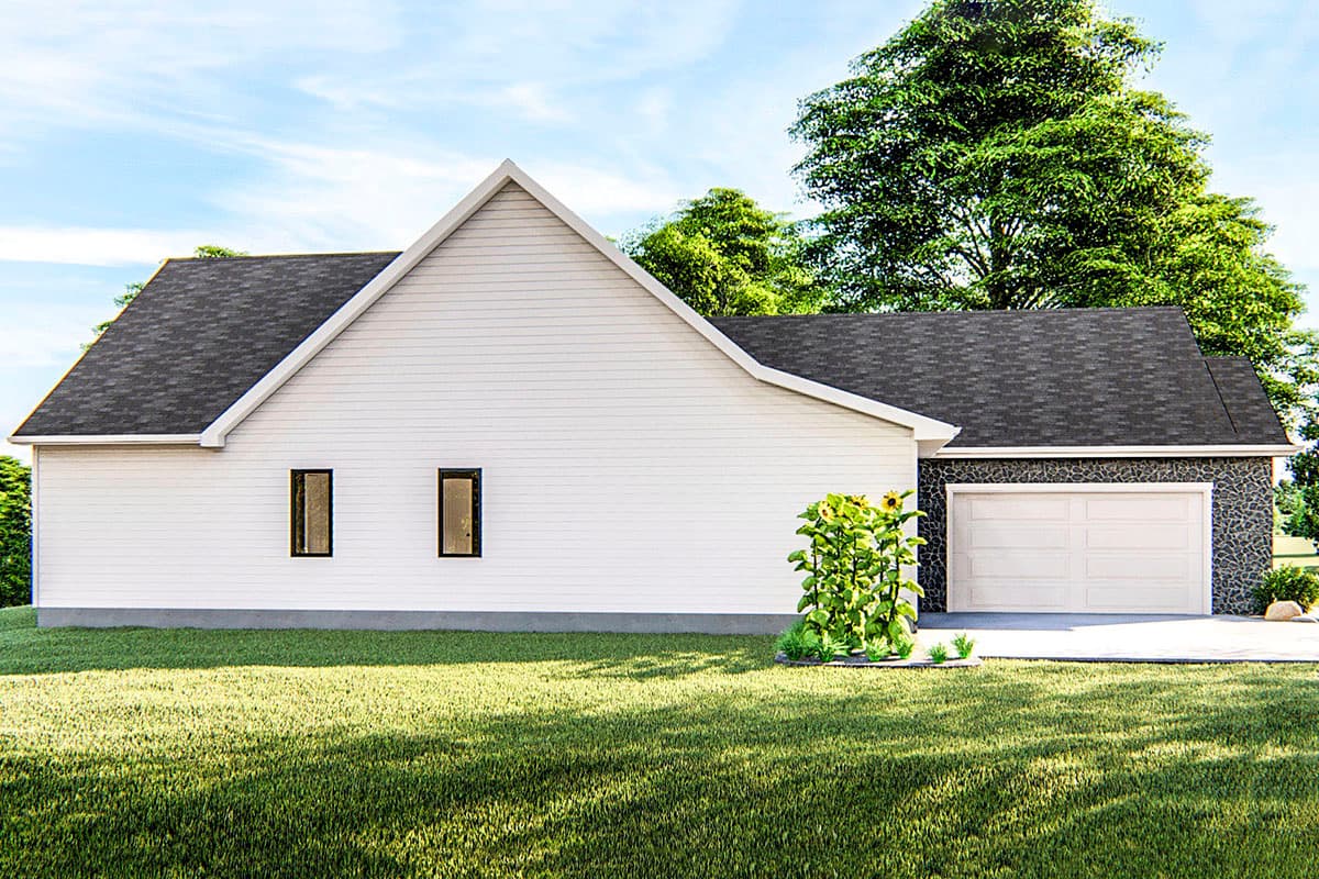 House plan exterior: Ranch style, white siding, gable roof, stone-clad garage, two windows.